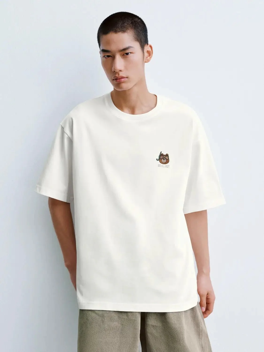 6075-cotton-embroidered-bear-logo-on-chest-t-shirts-1.webp Cotton Embroidered Bear Logo On Chest T-Shirts