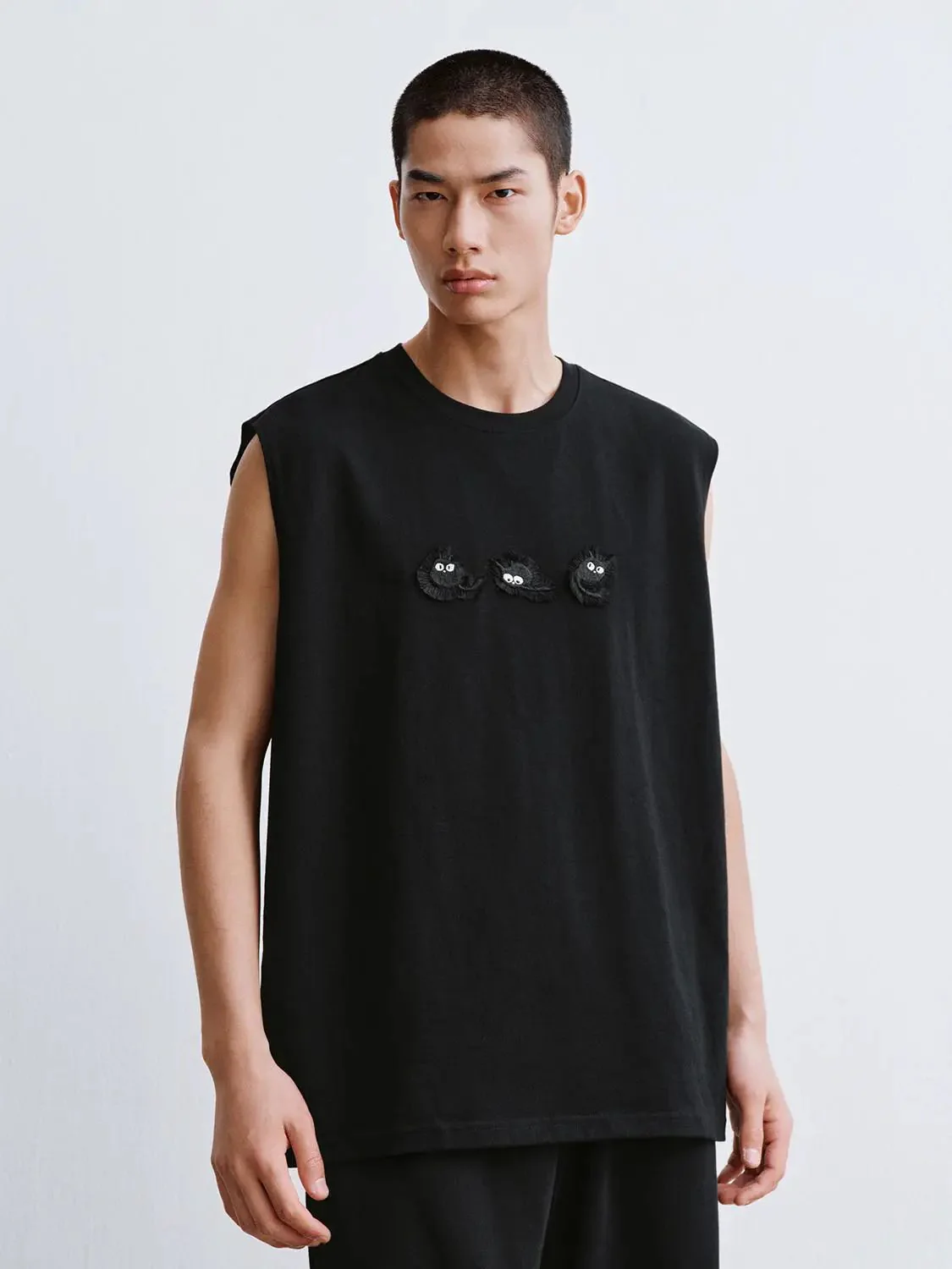 6386-cotton-black-sleeveless-top-with-eye-patch-embroidery-shirts-1.webp Cotton Black Sleeveless Top With Eye Patch Embroidery Shirts