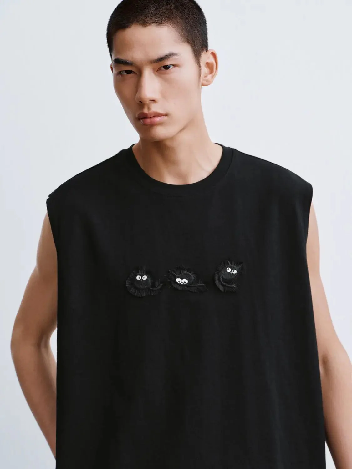 6386-cotton-black-sleeveless-top-with-eye-patch-embroidery-shirts-3.webp Cotton Black Sleeveless Top With Eye Patch Embroidery Shirts