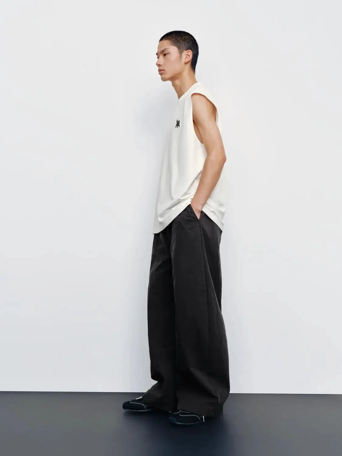 Cotton Black Sleeveless Design With Minimal Logo Tank Tops