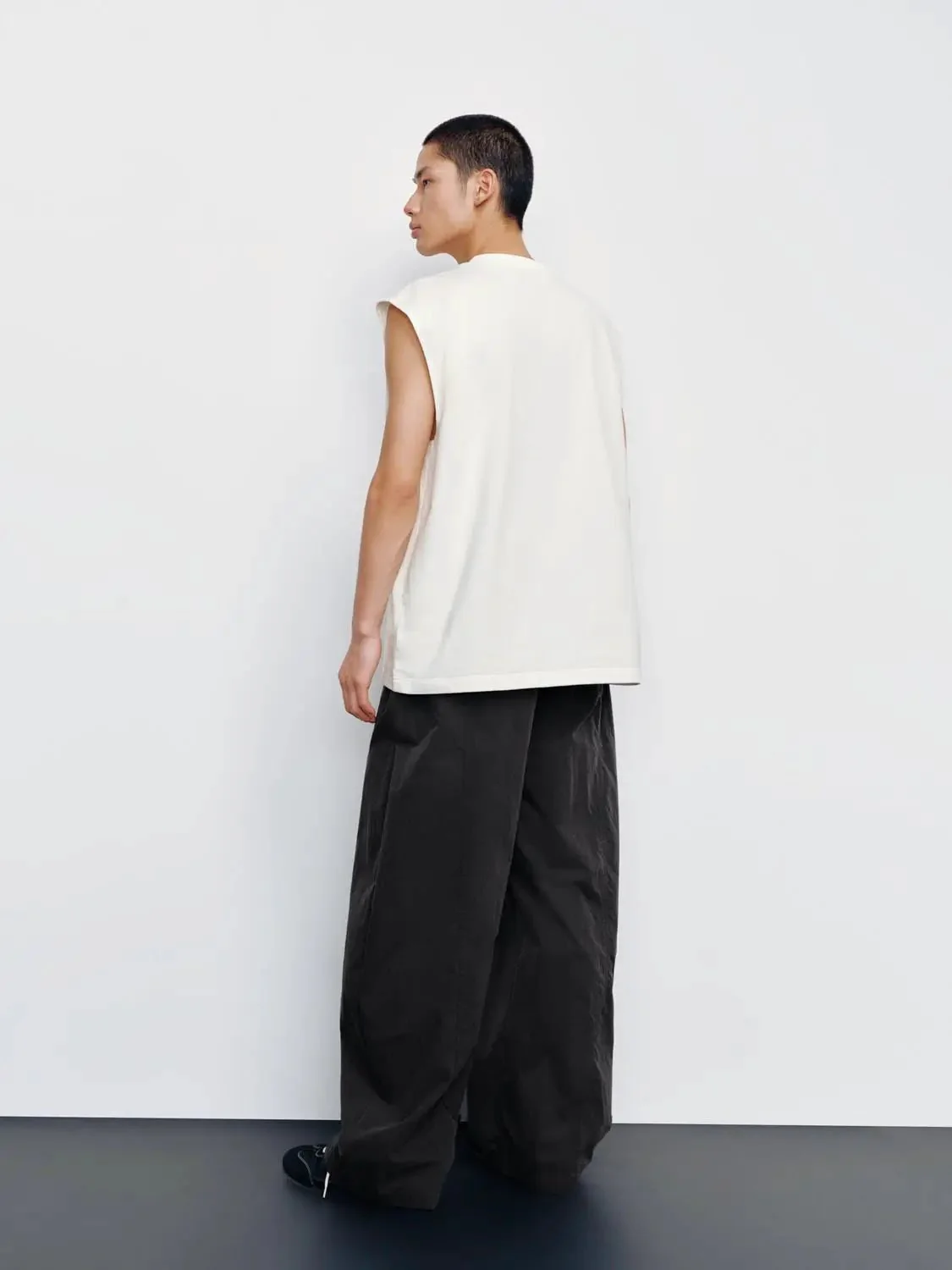 Cotton Black Sleeveless Design With Minimal Logo Tank Tops