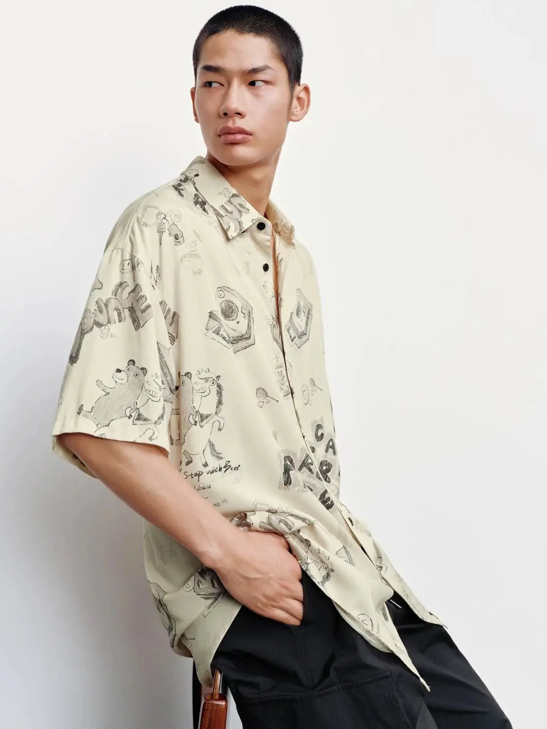 6749-beige-cotton-graphic-print-short-sleeve-shirts-2.webp Beige Cotton Graphic Print Short Sleeve Shirts