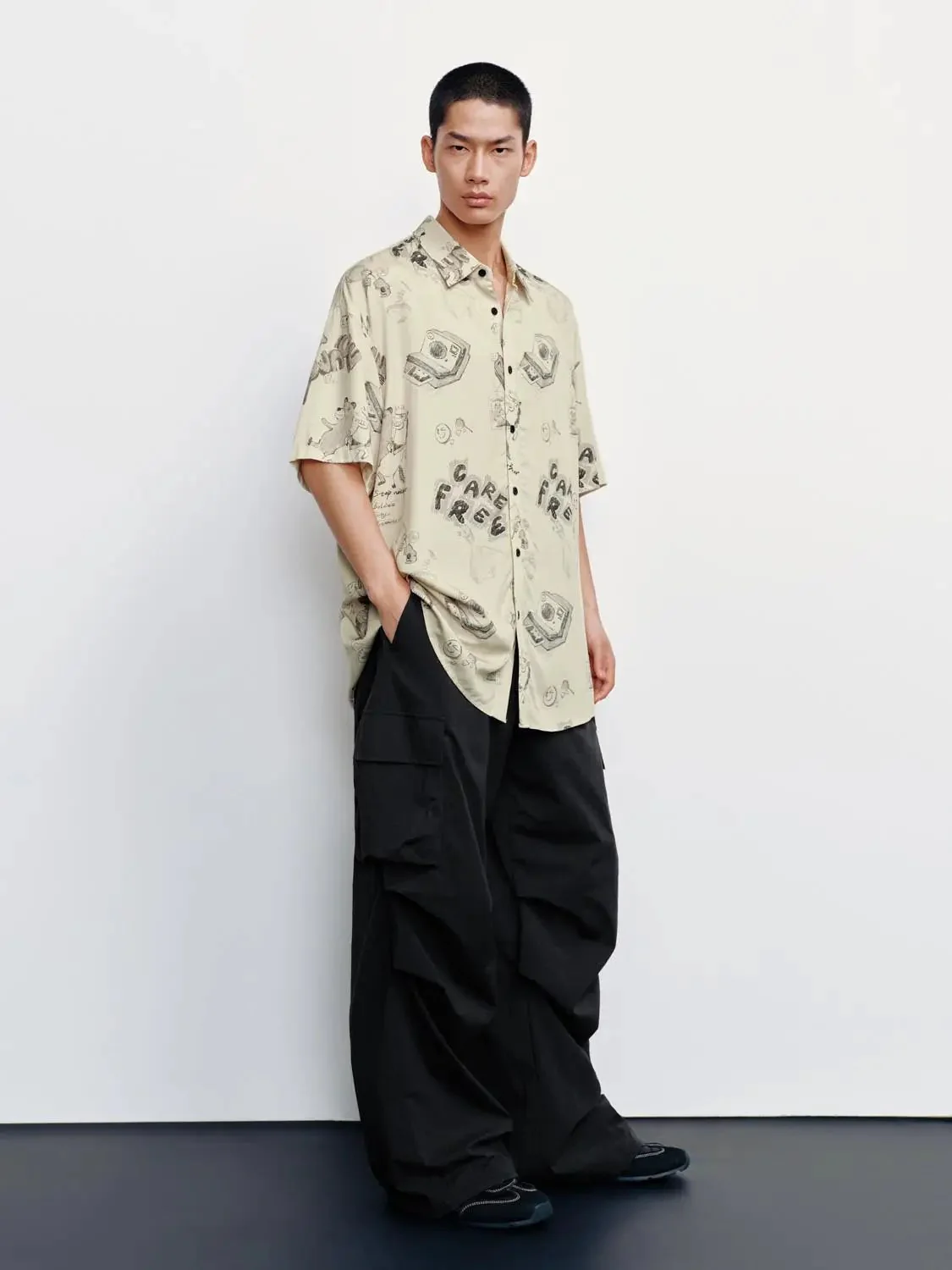 6749-beige-cotton-graphic-print-short-sleeve-shirts-5.webp Beige Cotton Graphic Print Short Sleeve Shirts