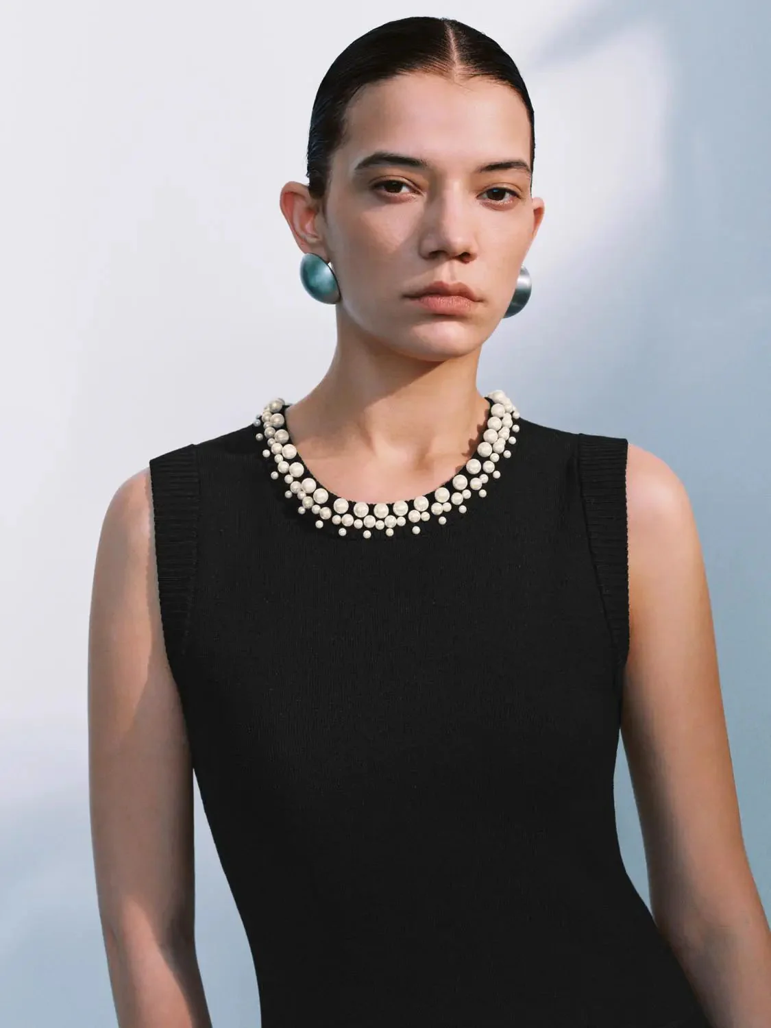 9002-elegant-textured-pearl-beaded-knit-mini-dress-3.webp Elegant Textured Pearl Beaded Knit Mini Dress
