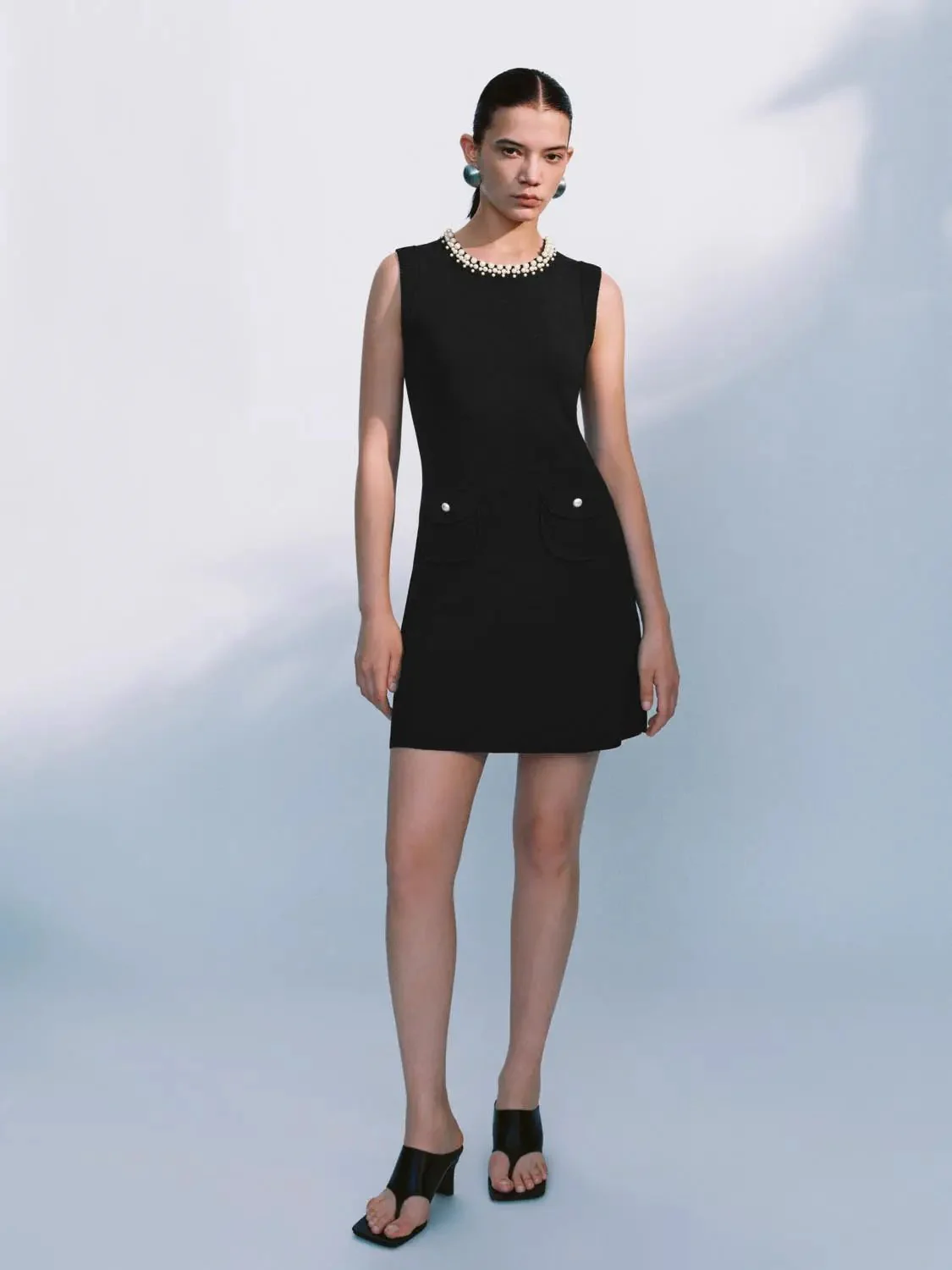9002-elegant-textured-pearl-beaded-knit-mini-dress-4.webp Elegant Textured Pearl Beaded Knit Mini Dress