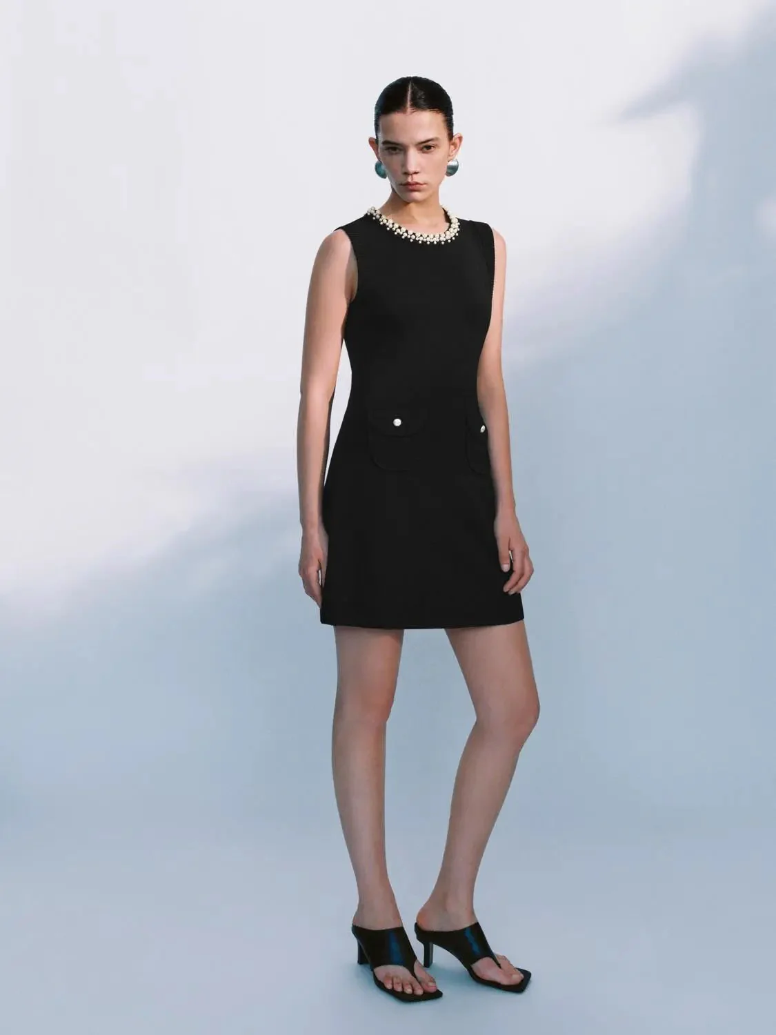 9002-elegant-textured-pearl-beaded-knit-mini-dress-5.webp Elegant Textured Pearl Beaded Knit Mini Dress
