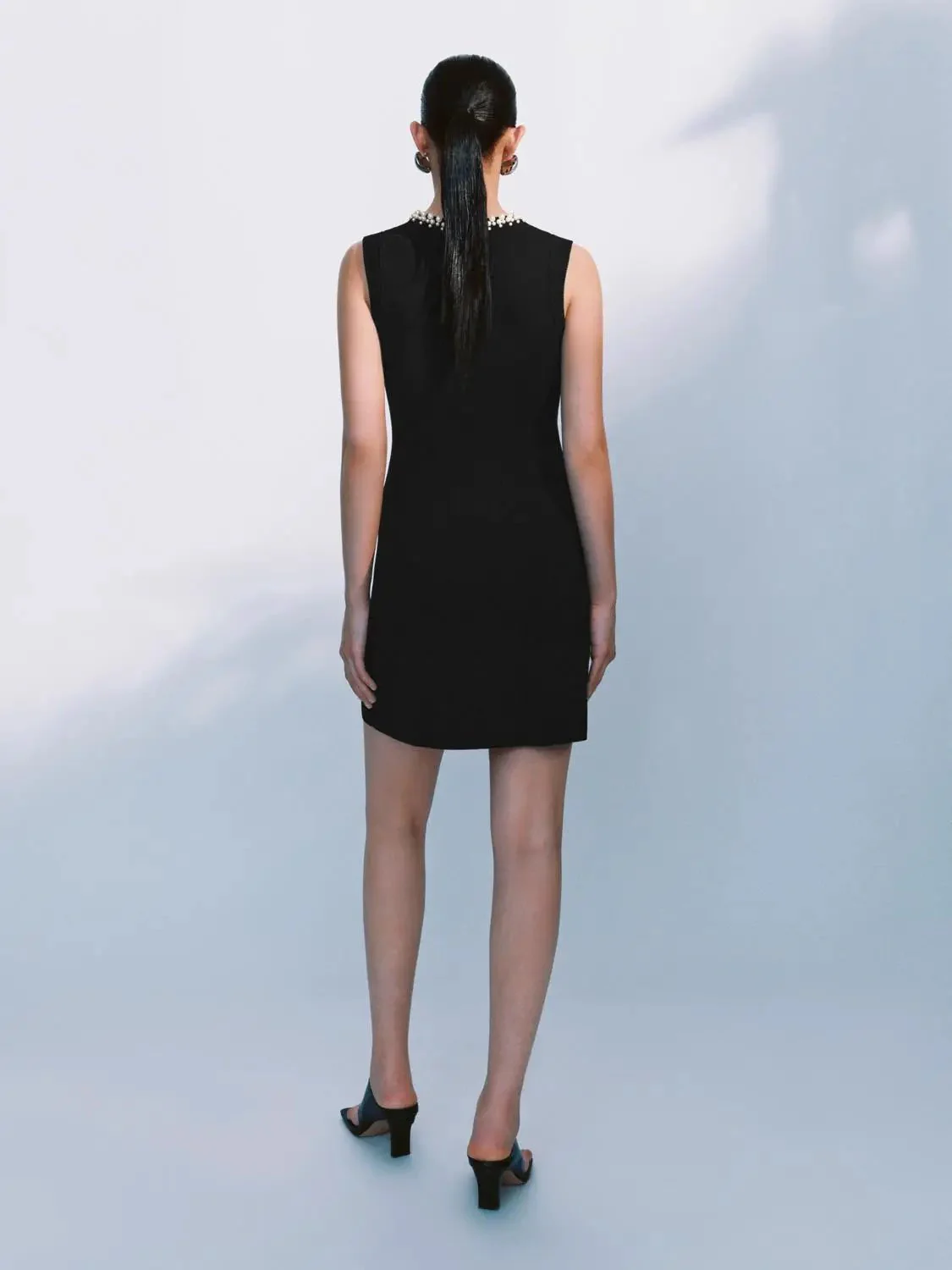 9002-elegant-textured-pearl-beaded-knit-mini-dress-6.webp Elegant Textured Pearl Beaded Knit Mini Dress