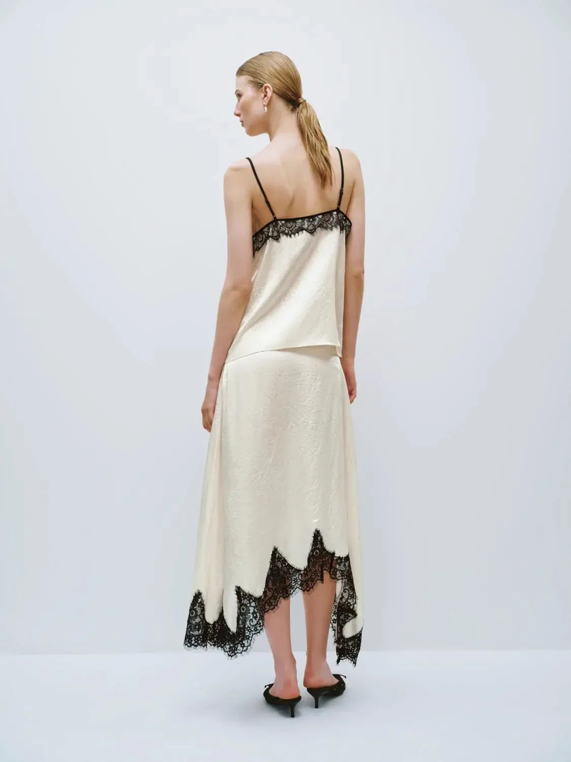 9086-irregular-lace-hem-a-line-skirts-4.webp Irregular Lace Hem A-Line Skirts