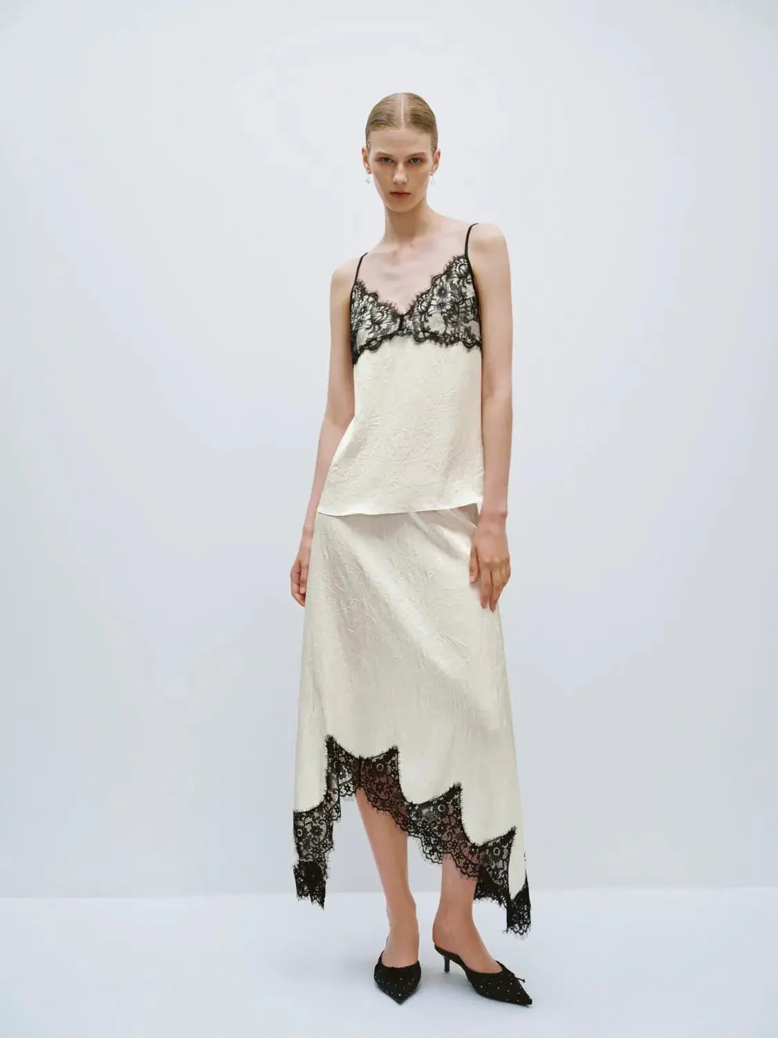 9086-irregular-lace-hem-a-line-skirts-6.webp Irregular Lace Hem A-Line Skirts