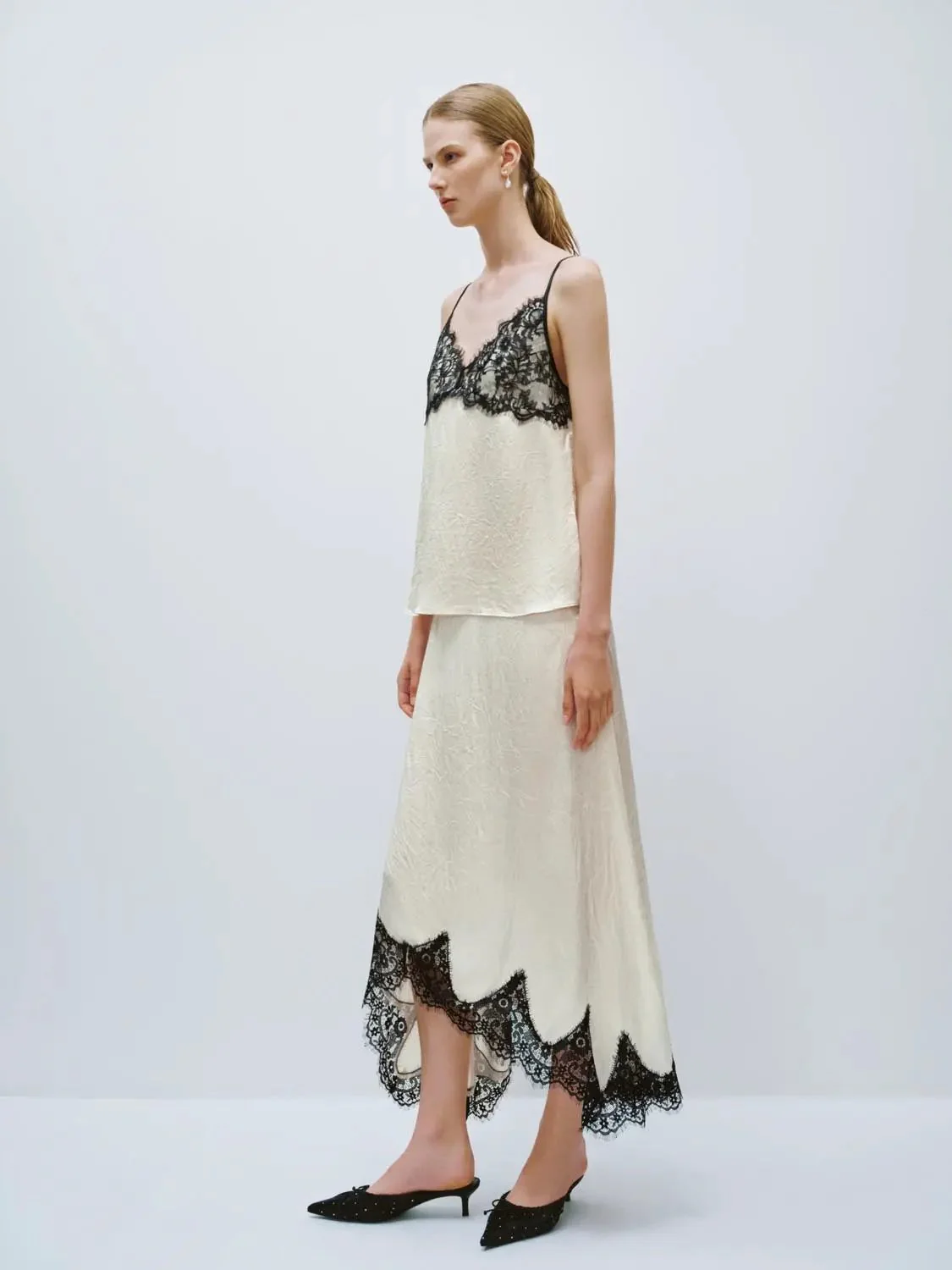9086-irregular-lace-hem-a-line-skirts-7.webp Irregular Lace Hem A-Line Skirts