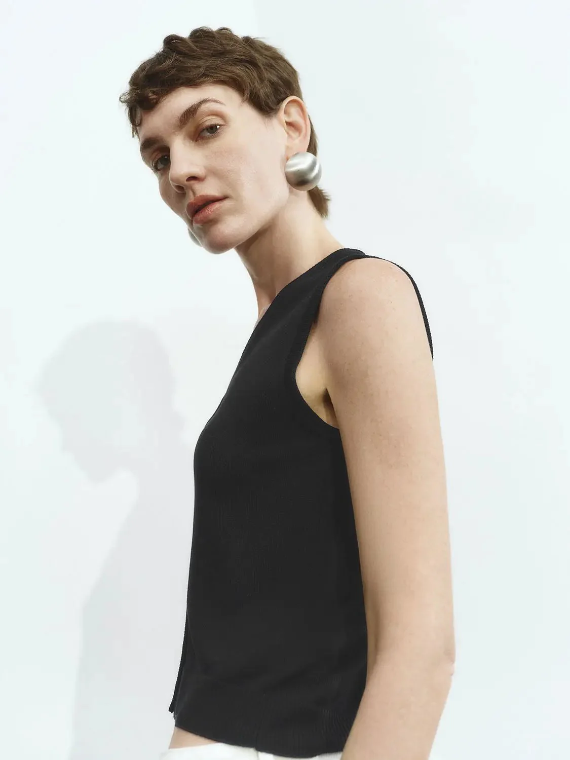 9136-sleeveless-knitted-cardigans-18.webp Sleeveless Knitted Cardigans