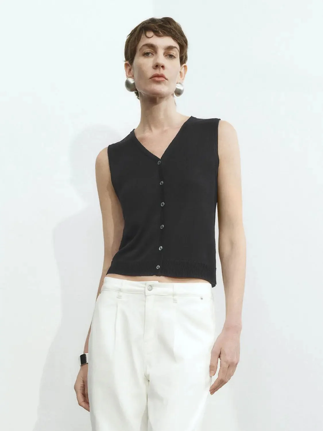 9136-sleeveless-knitted-cardigans-24.webp Sleeveless Knitted Cardigans