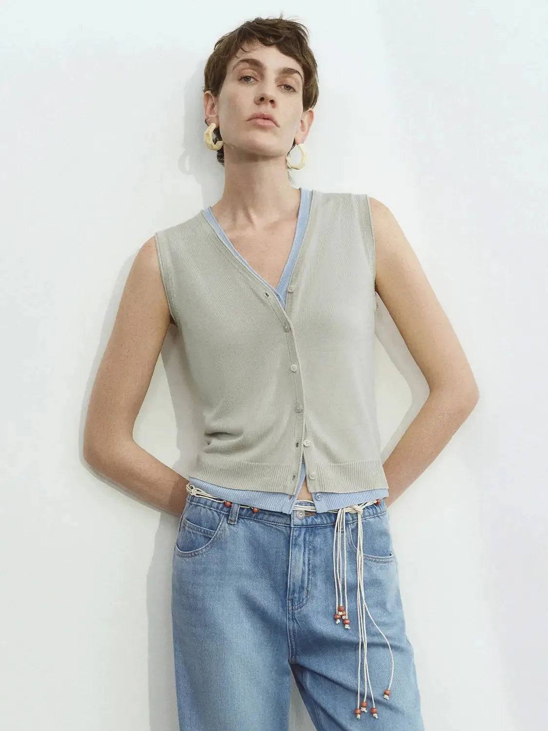 9136-sleeveless-knitted-cardigans-8.webp Sleeveless Knitted Cardigans