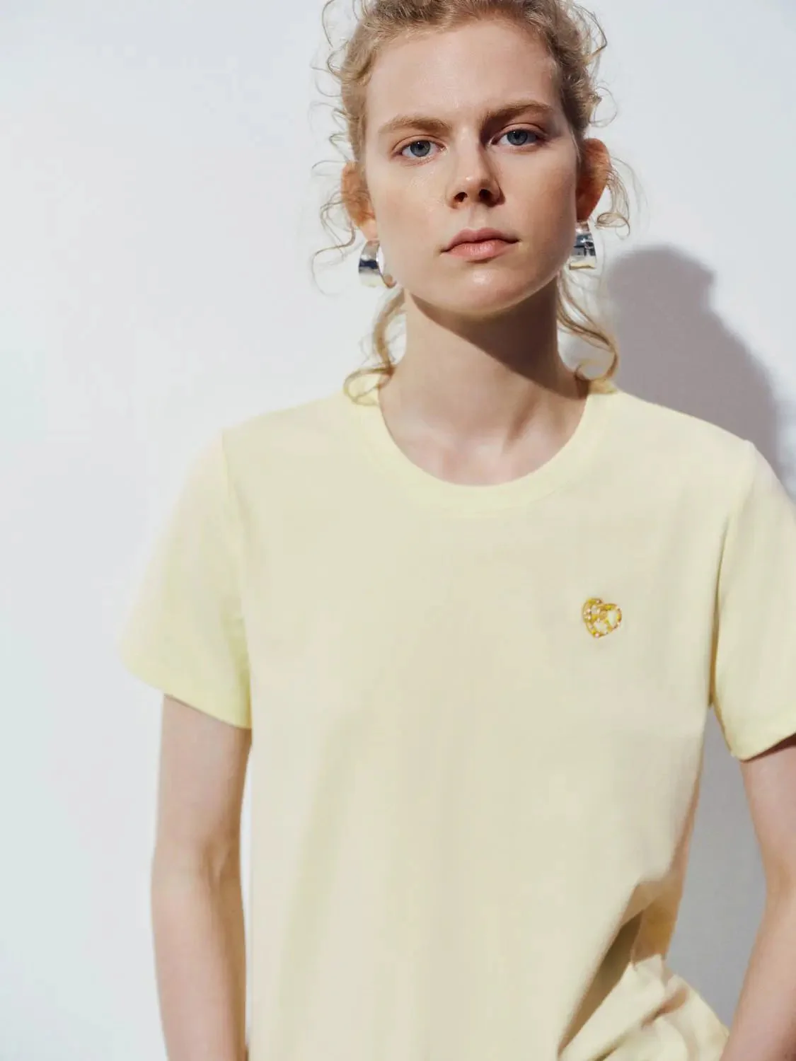 9245-cotton-blend-gold-heart-emblem-soft-t-shirts-3.webp Cotton Blend Gold Heart Emblem Soft T Shirts