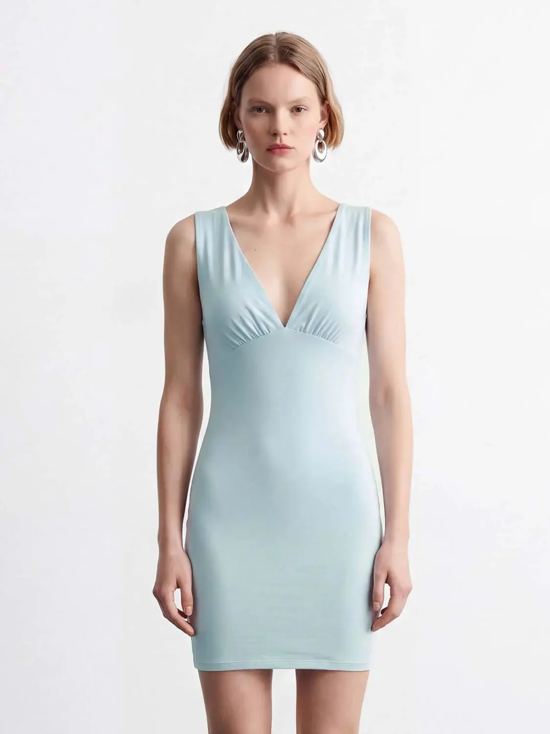 9355-modal-blend-v-neck-sleeveless-stretch-fabric-easy-care-bodycon-mini-dresses-1.webp Modal Blend V-Neck Sleeveless Stretch Fabric Easy Care Bodycon Mini Dresses